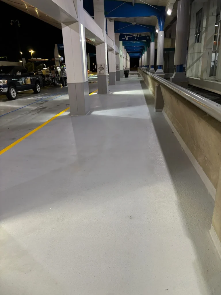 Pressure washing sidewalks at Jackson Medgar Wiley Evers International Airport in Pearl, MS.