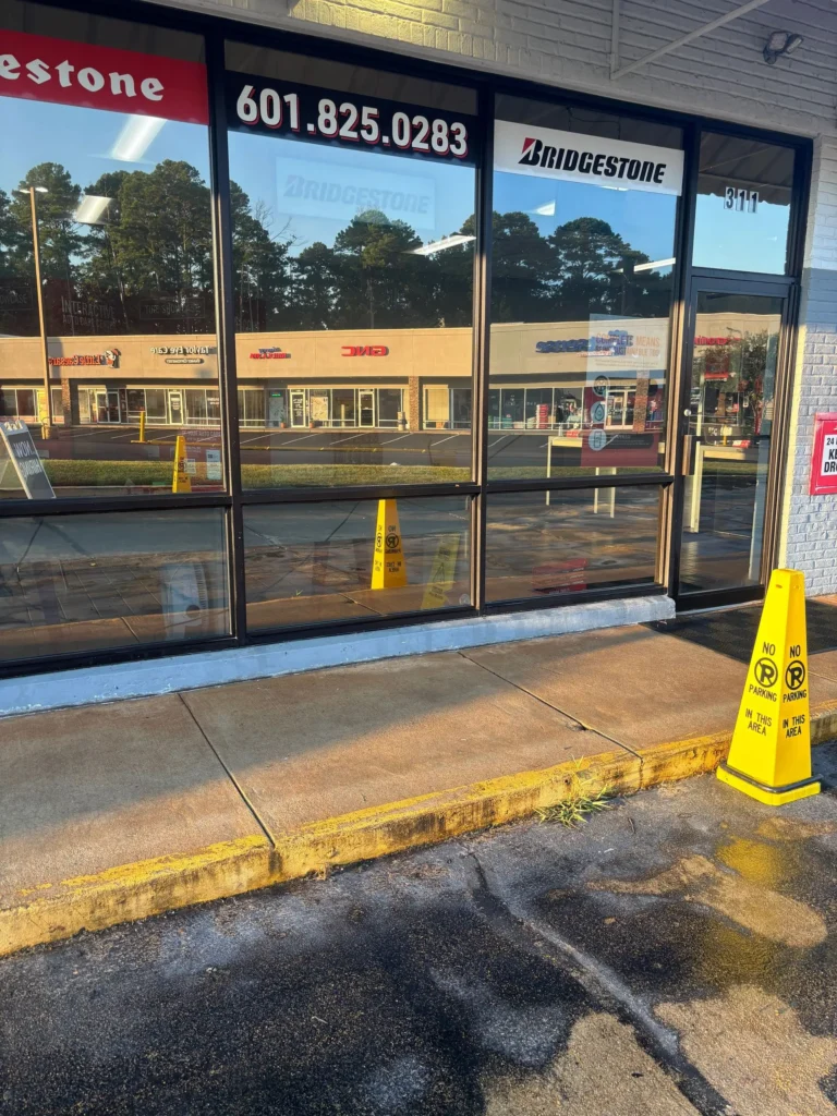 Clean glass and concrete after a storefront cleaning in Brandon, MS.